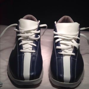 Woman's Nike blue and white leather golf shoe